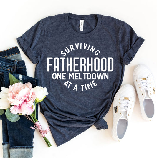 Surviving Fatherhood One Meltdown At A Time T-shirt